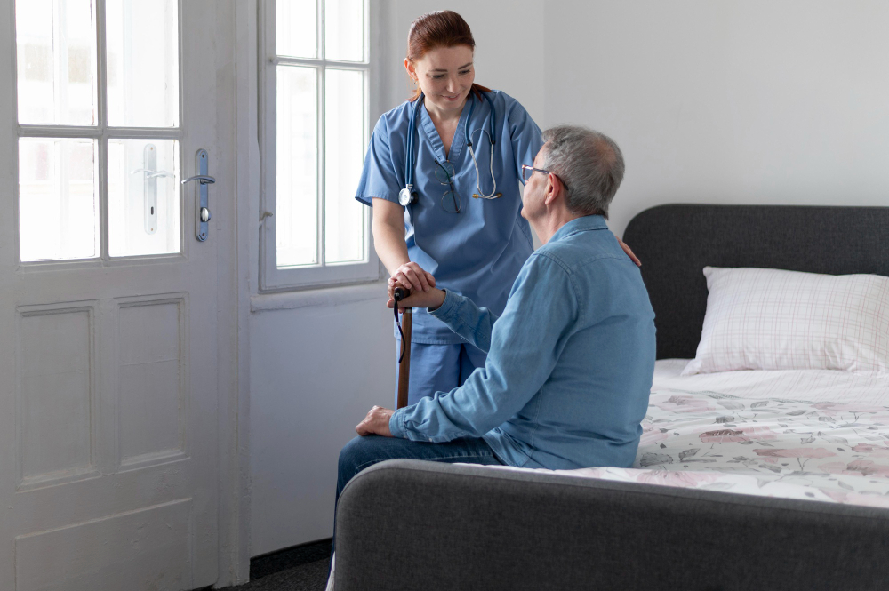 Nurse holding a patient's hand, offering emotional support